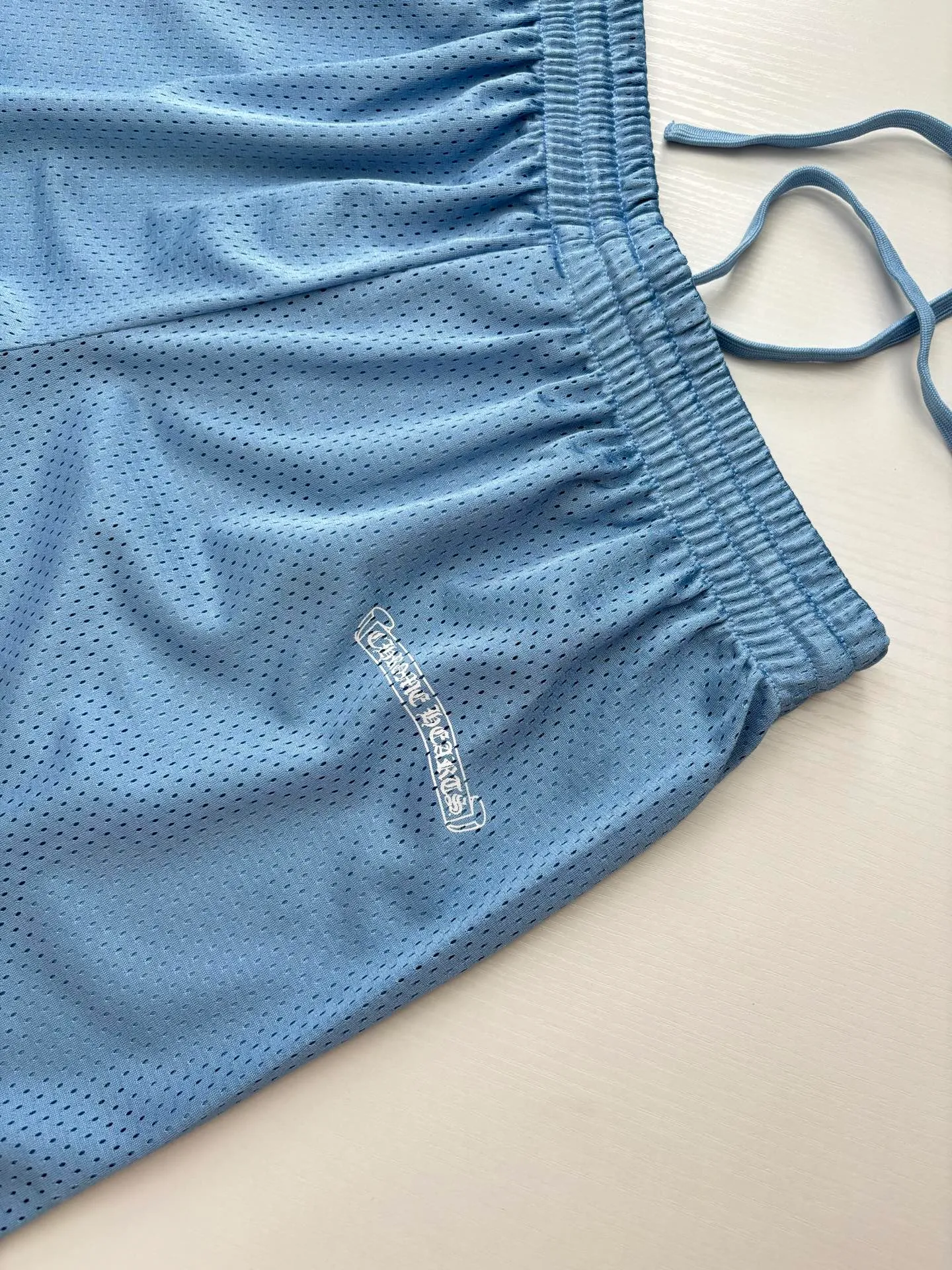 🅿️290 Chrom Heart*/Ch 25SS mesh glitter blue ice hockey shorts. The fabric is made of high-density 100D bird's eye cloth. Double-sided mesh positioning is very time-consuming. The cost of labor loss is very high. It is not a single-layer thin transparent bottom junk product on the market. Same style for men and women. OS size: S/M/L